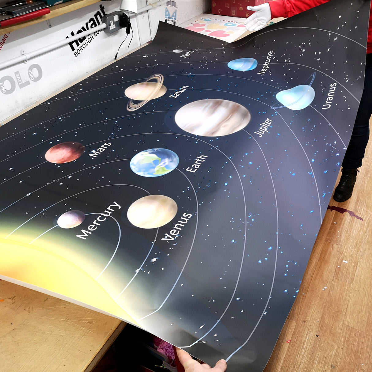 Fabric wall sticker being hand finished