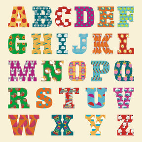 Colorful alphabet letters on a beige background
