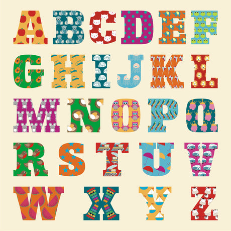 Colorful alphabet letters on a beige background