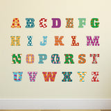 Colorful alphabet letters on a beige background