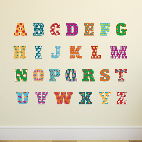 Colorful alphabet letters on a beige background