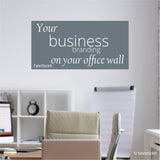 Office setting with a wall decal promoting 'Your business branding on your office wall' by FabriStick.